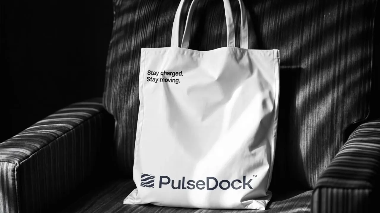 PulseDock branded tote in a black-and-white interior