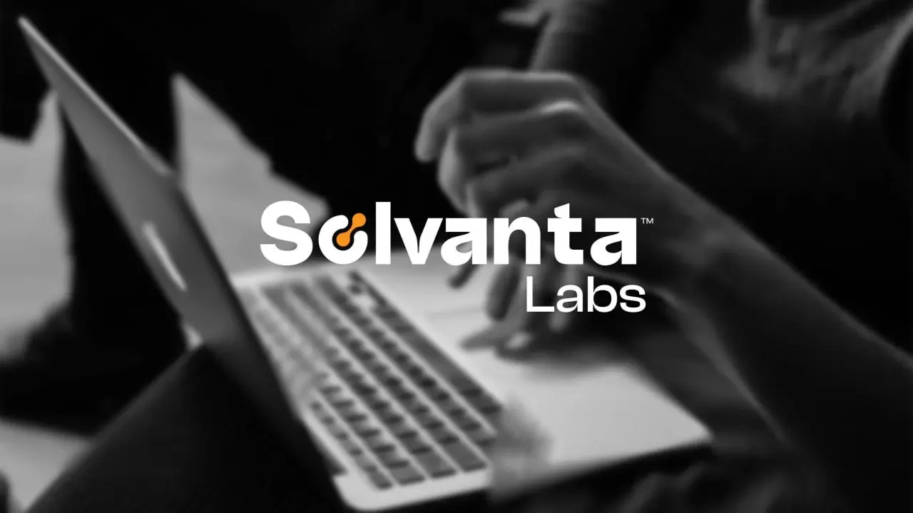 Solvanta Labs identity over a black-and-white technology image